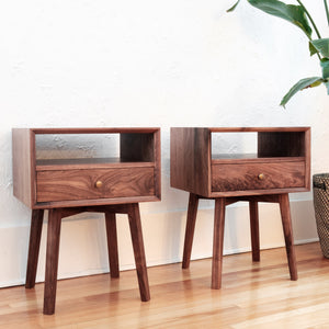 Mid mentury pair of walnut nightstands with one drawer, one open shelf, bevelled front edge